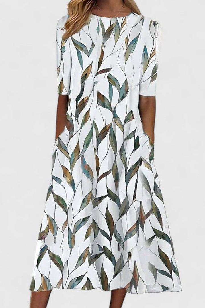 Floral print A-line midi dress for women, featuring short sleeves and a round neck, versatile fashion.