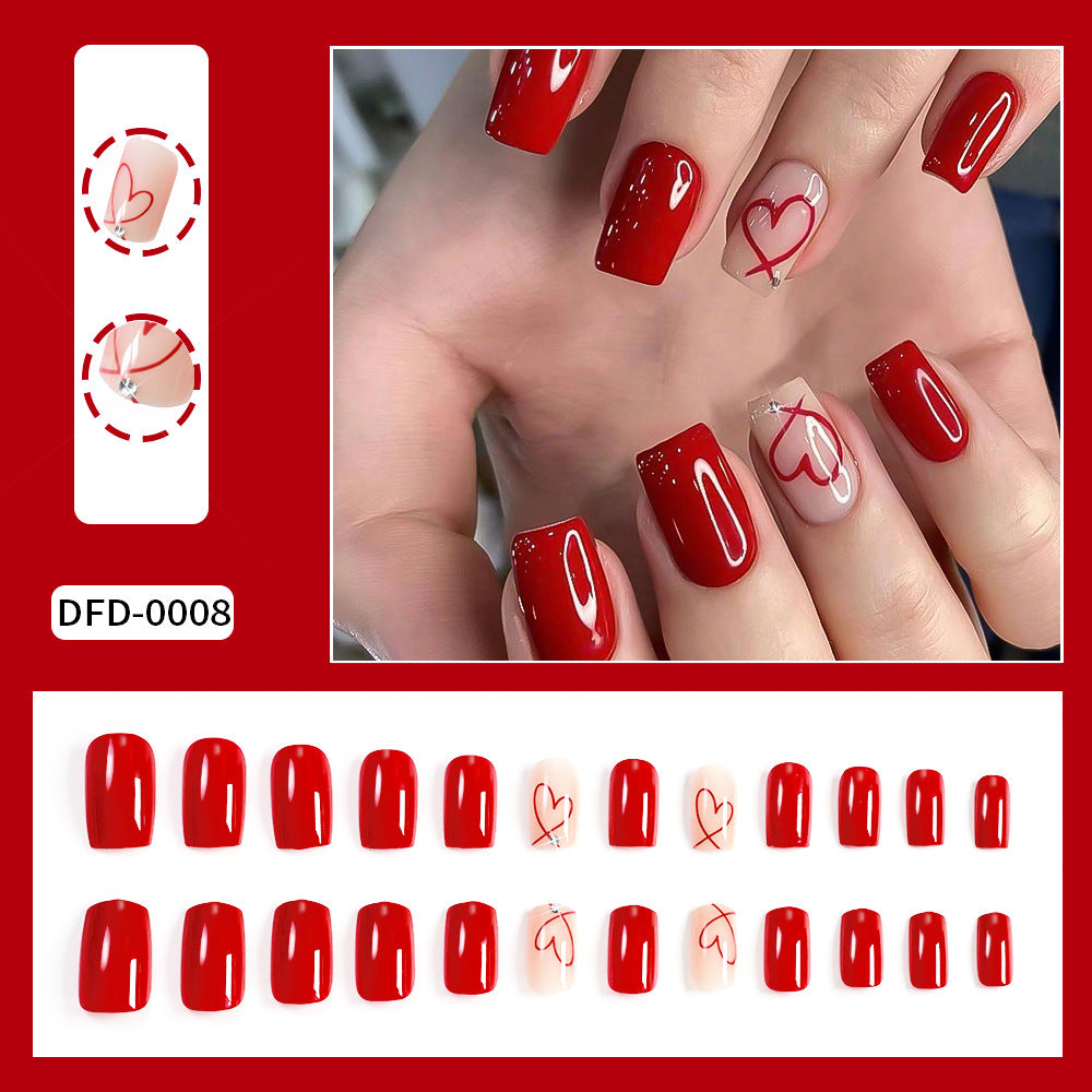 Stylish abstract heart press-on nails for women. Easy DIY fake nail art set for a quick, chic manicure.