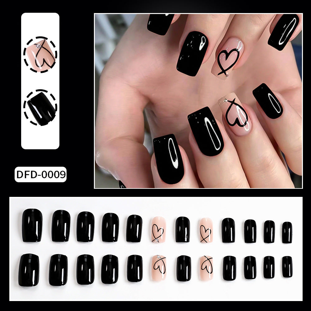 Trendy women's abstract heart press-on nails. Perfect for a quick DIY manicure with elegant, stylish fake nail art.