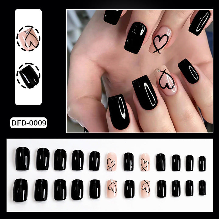 Trendy women's abstract heart press-on nails. Perfect for a quick DIY manicure with elegant, stylish fake nail art.