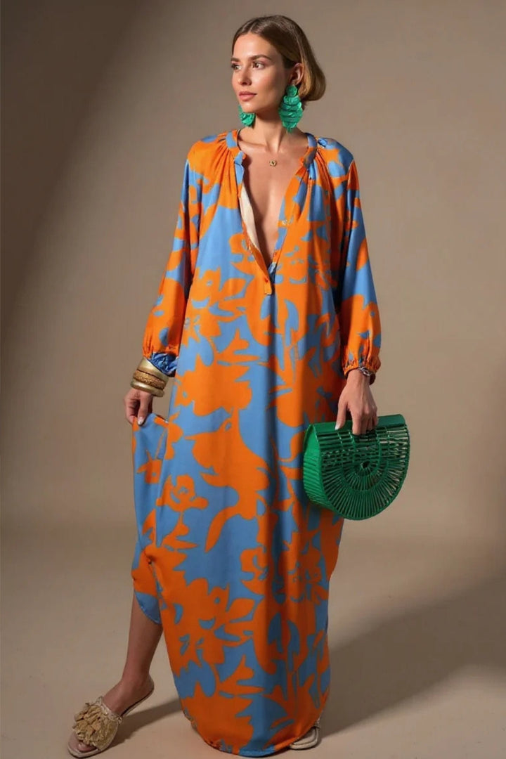 Boho style abstract print maxi kaftan dress, a flowy V-neck summer dress ideal for beach cover-up or holidays.
