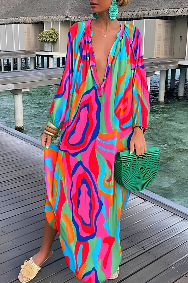 Stylish abstract print women's kaftan maxi dress. Flowy V-neck design, versatile as a summer dress or beach cover-up.