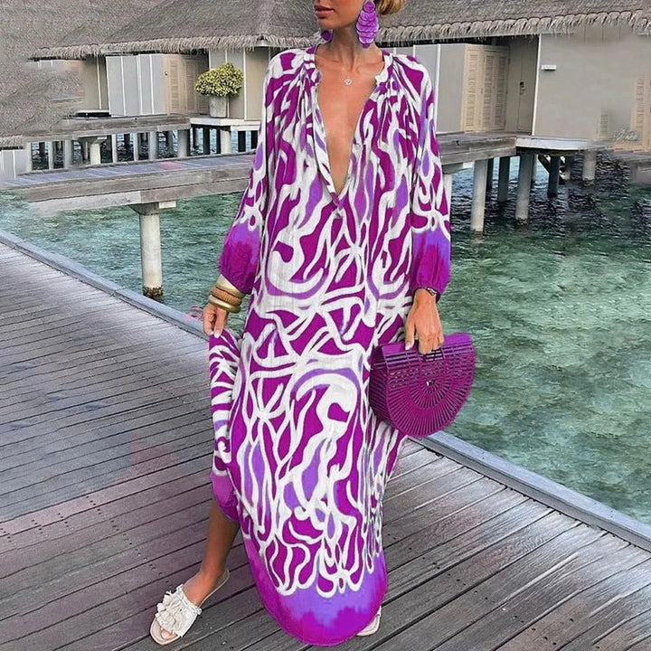 Bohemian abstract print maxi kaftan dress for women. Ideal resort wear, featuring a deep V-neck and relaxed fit.