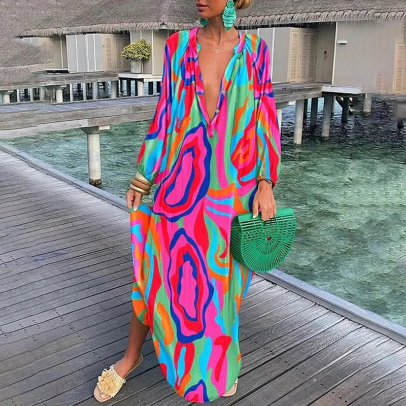 Women's V-neck abstract print kaftan dress. Perfect holiday beach cover-up or elegant summer resort wear.