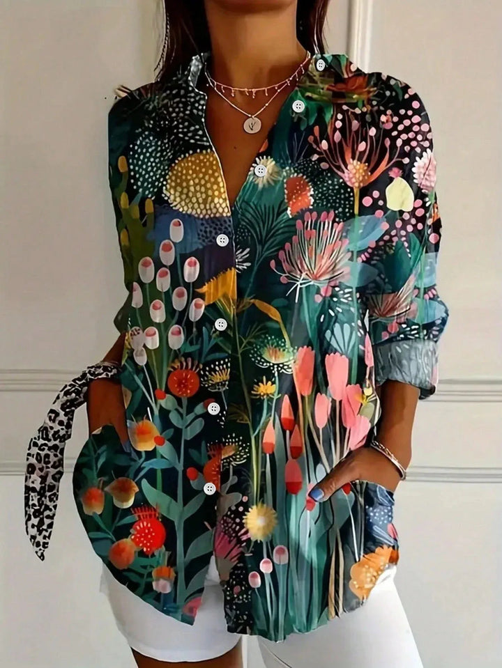 Colorful abstract print women's blouse, a relaxed fit summer top. Trendy and easy wear.