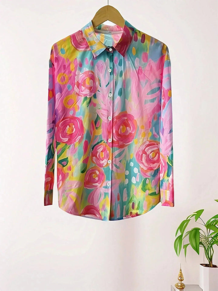 Vibrant abstract print women's blouse, relaxed fit, perfect for stylish casual summer outfits.