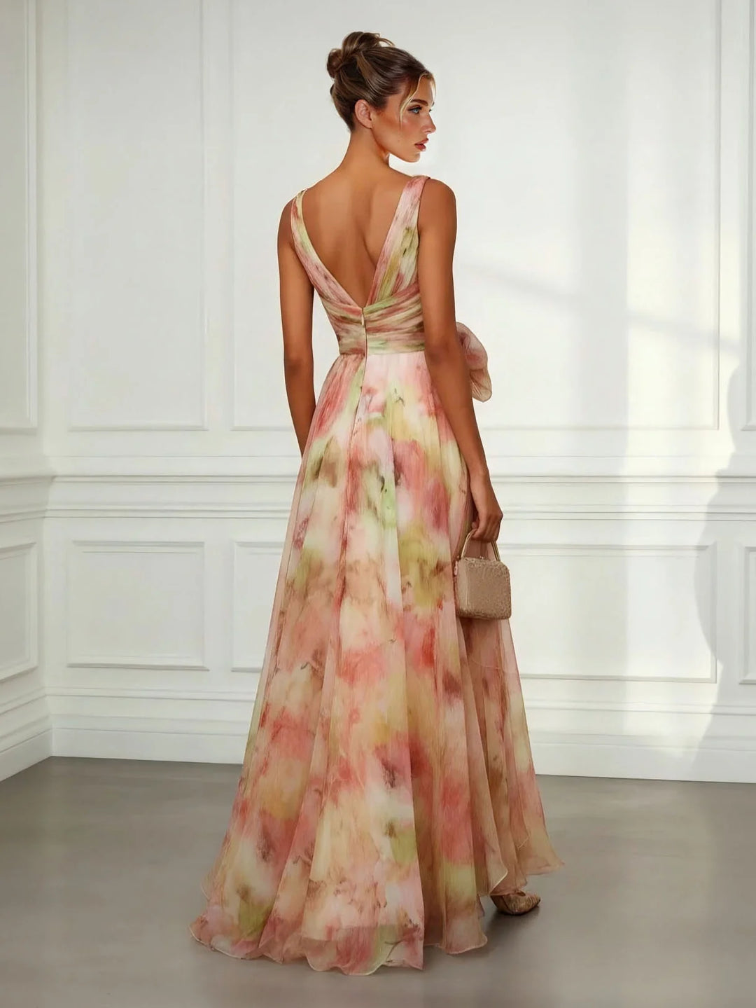 Elegant women's abstract print maxi dress with V-neckline & flattering tie-waist. Ideal as a summer or occasion dress.