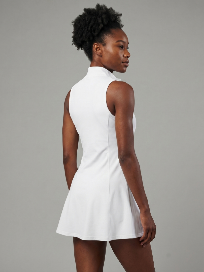 Woman wearing a Women's Active Flow Tennis Dress, ideal for tennis, activewear, and casual summer outings.