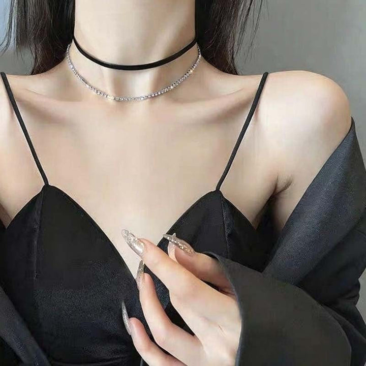 Adjustable black leather choker necklace for women, versatile fit, adds a modern touch to any outfit.