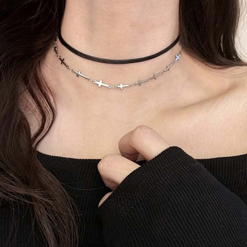 Versatile women's black leather choker, adjustable necklace perfect for layering or a standalone minimalist statement.