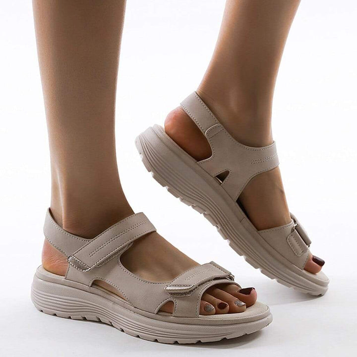 Supportive women's sandals with padded, adjustable straps ensure all-day comfort for walking.