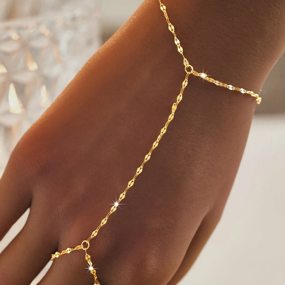 Women's adjustable gold link body chain jewelry, elegant and trendy accessory for layering fashion.