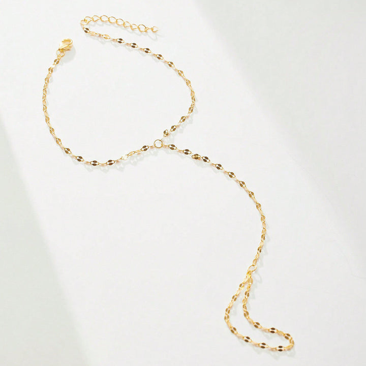 Elegant gold adjustable body chain for women, a stylish link chain layering piece for modern fashion.