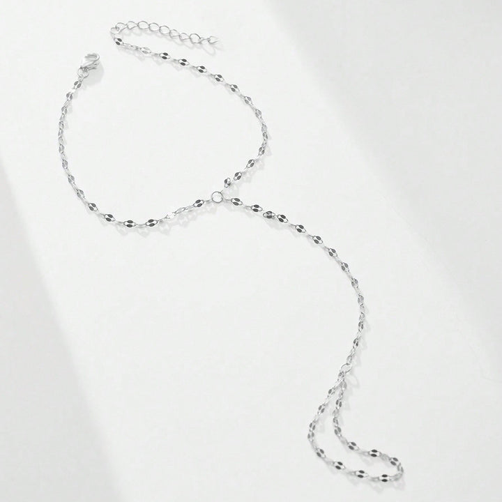 Chic women's gold-tone adjustable link chain body jewelry, a fashionable and versatile accessory.