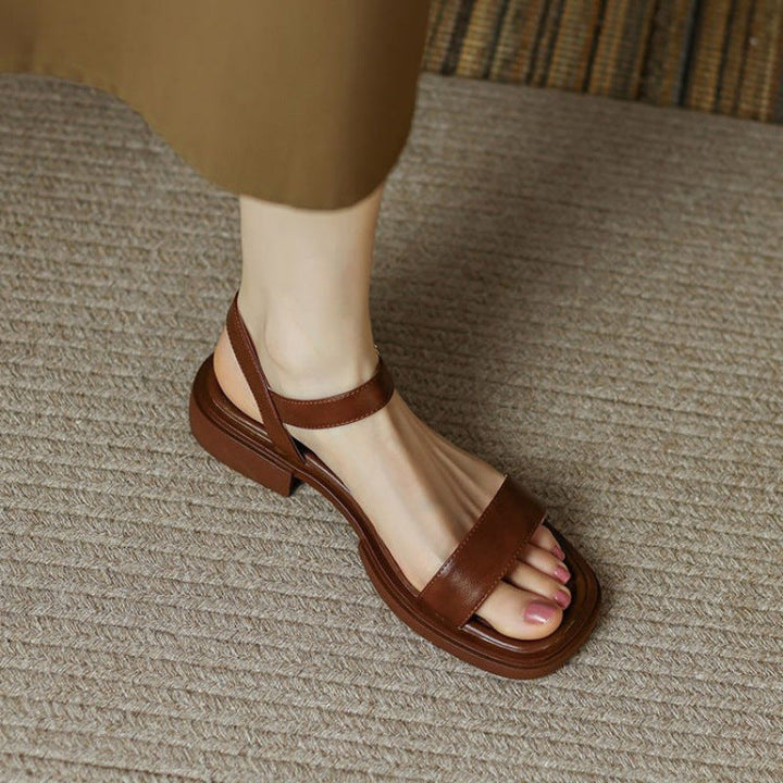 Stylish women's open-toe sandals with adjustable straps, ideal for summer, beach & holiday footwear.