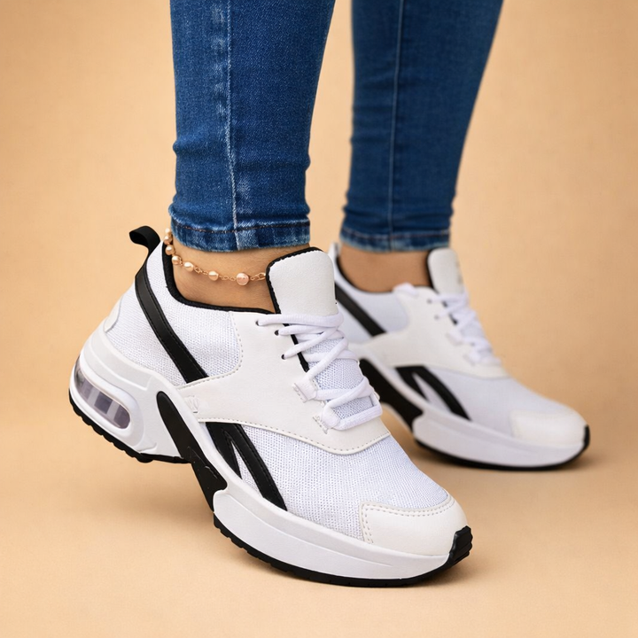Women's air cushion comfort sneakers for everyday walking, lightweight and breathable athletic footwear.