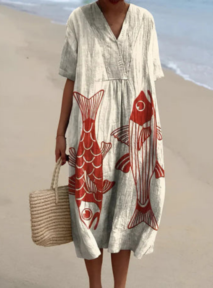 Flowing women's artisan summer dress, comfortable and effortlessly chic. Ideal for travel, casual outings, or special occasions.