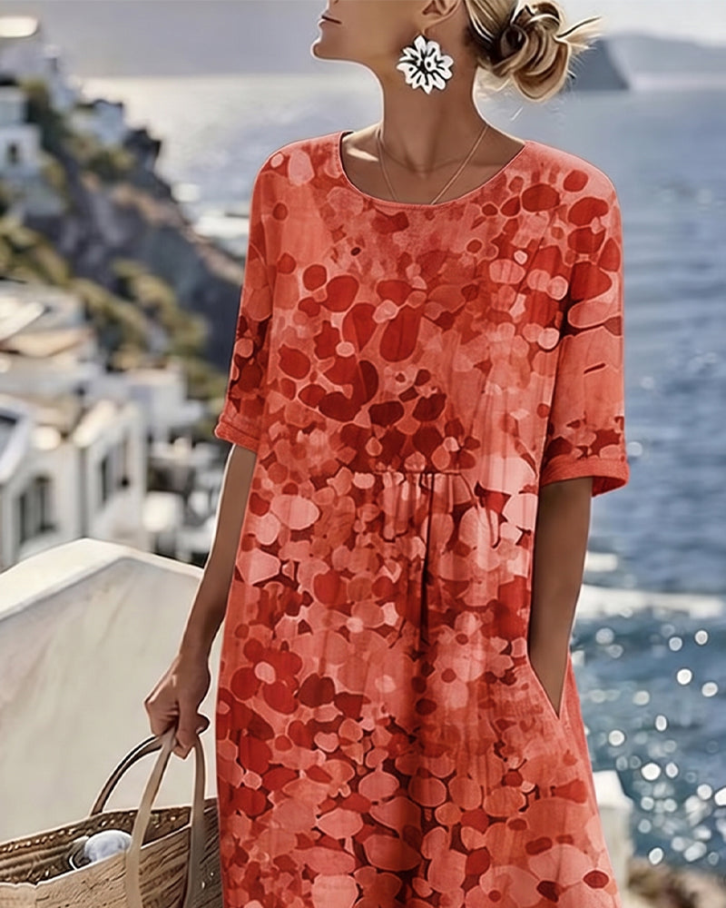 Lightweight women's airy midi dress, adorned with a lovely floral print and practical short sleeves.