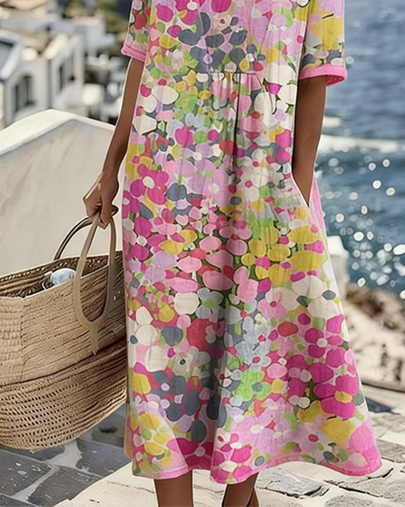 Airy women's floral midi dress, flattering A-line cut with short sleeves, suitable for various occasions.