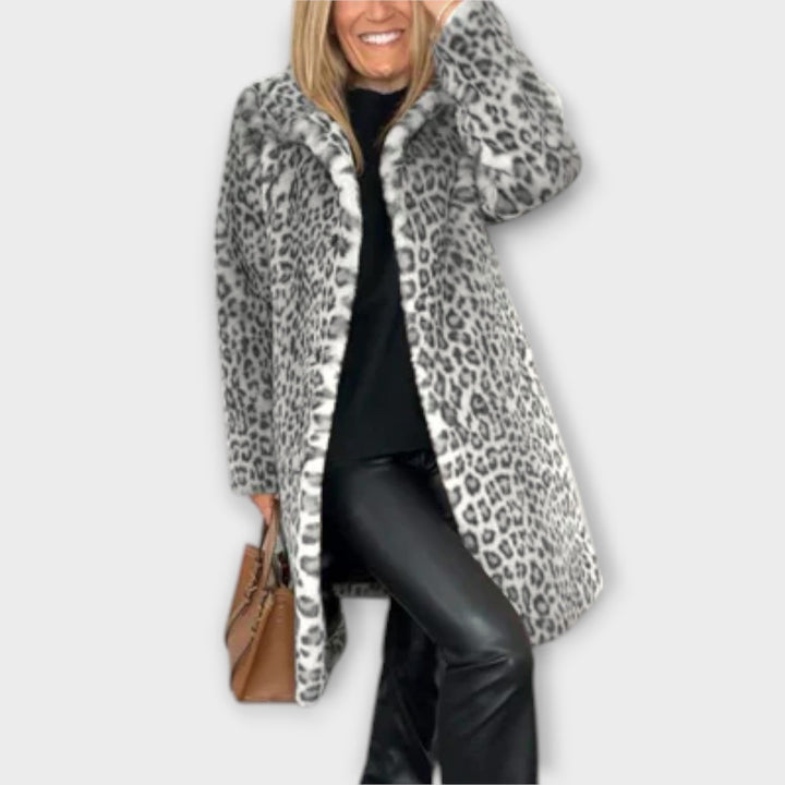 Elegant women's long sleeve leopard coat, a timeless animal print fashion jacket for chic winter style.