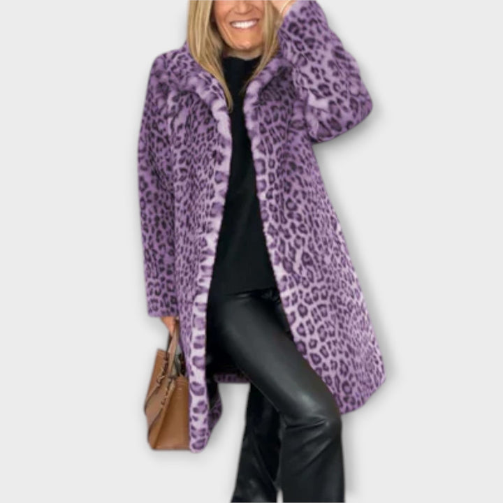 Amara women's leopard coat, featuring a stunning animal print design. A statement piece for elegant winter fashion.