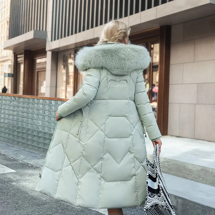 Premium women's long winter parka, hooded, plush trim, providing superior cold weather warmth.