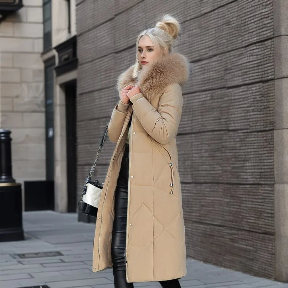 Women's utility long parka, hooded with plush trim, an insulated outdoor jacket for winter.