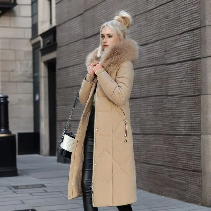 Women's utility long parka, hooded with plush trim, an insulated outdoor jacket for winter.