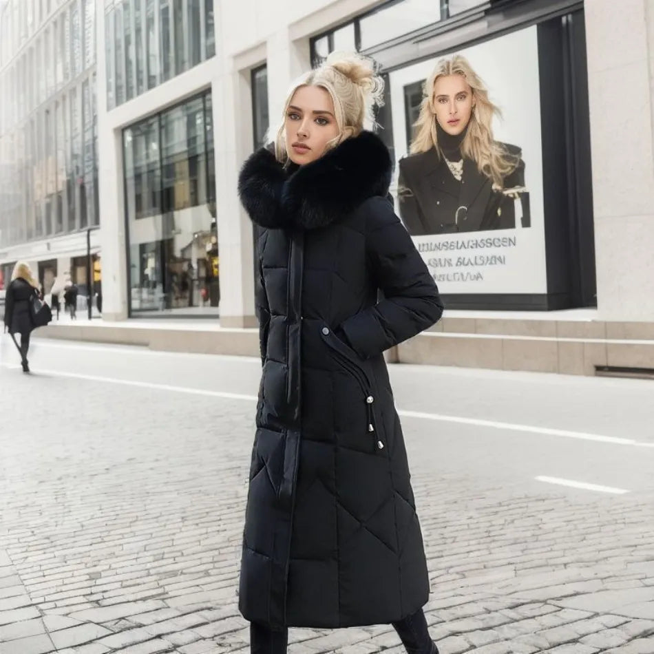Women's long insulated parka, hooded with soft fluffy trim, ideal for harsh winter fashion.