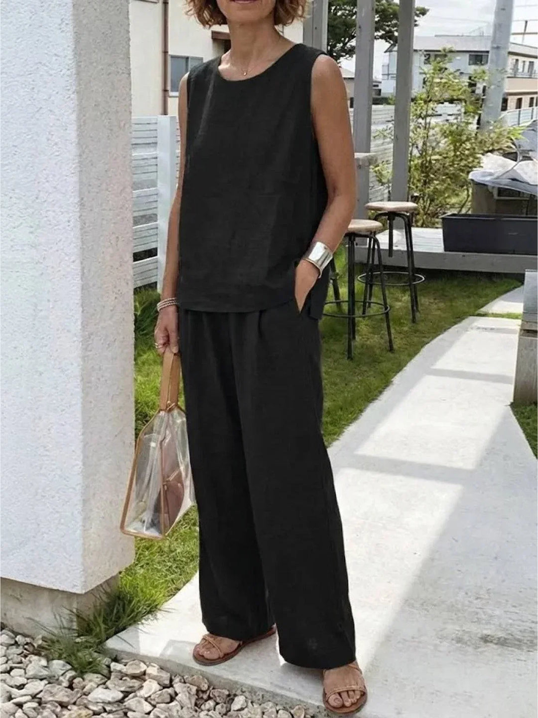 Women's comfortable two-piece set with sleeveless top & wide-leg pants, perfect for travel.