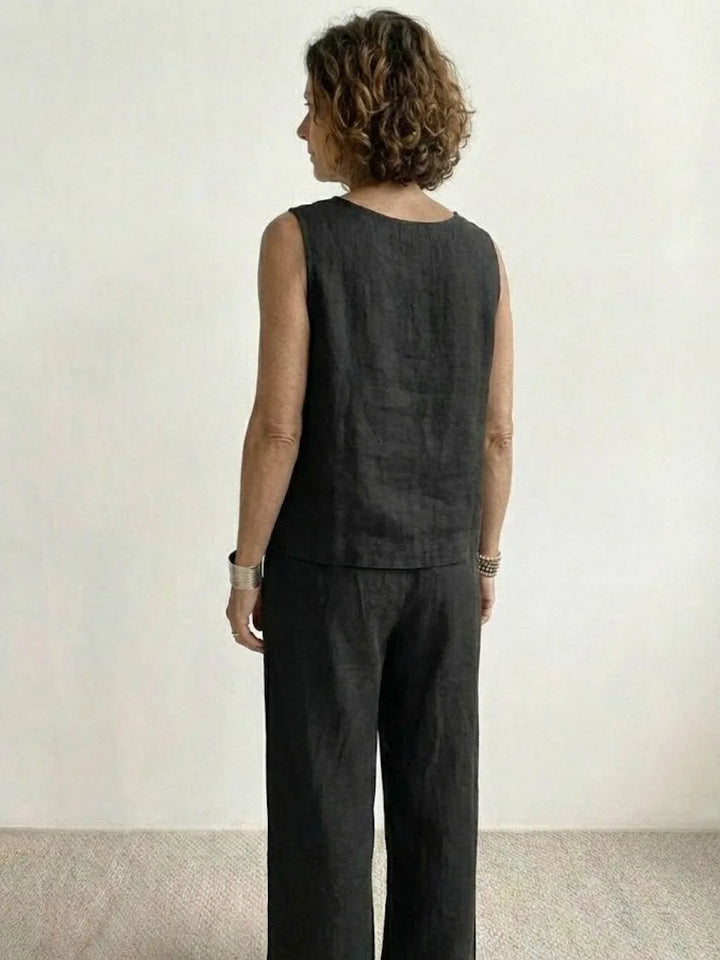 Army green women's set: sleeveless high-neck top & flowy wide-leg palazzo pants.