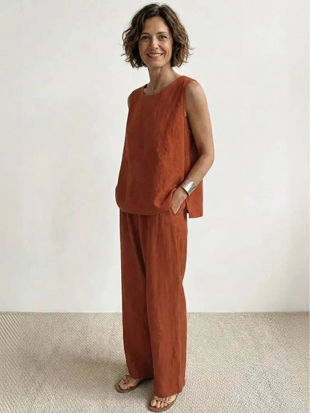 Army green women's stylish two-piece set: sleeveless top and comfortable wide-leg pants.