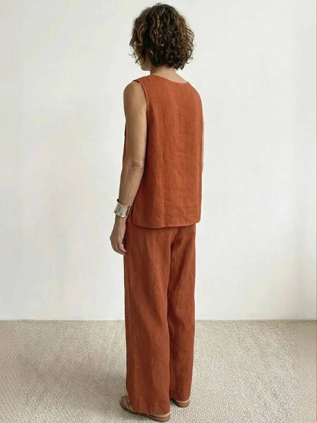 Beige women's spring/summer set: sleeveless loose top & wide-leg drawstring pants.
