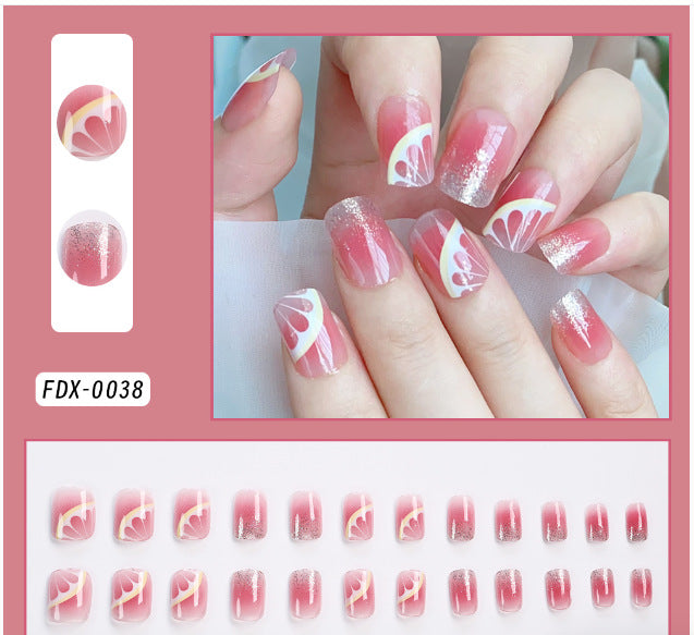 Women's artistic press-on nail set with elegant design for an effortless, instant manicure.