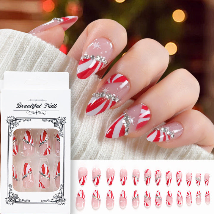 Glamorous red long coffin press-on nails with diamante, ideal for women's special occasion nail art.