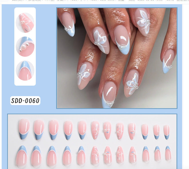 Short square press-on nails with minimalist design, offering a stylish artificial manicure.