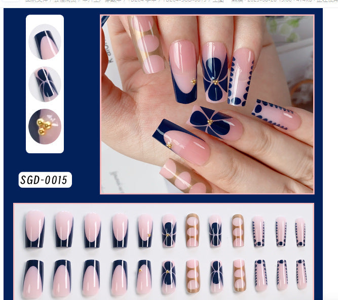 Trendy matte black press-on nails with silver glitter, modern false nail art design for women.