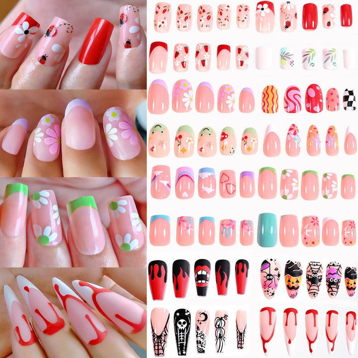 Women's artistic press-on nails with intricate designs, perfect for a reusable salon-quality manicure.
