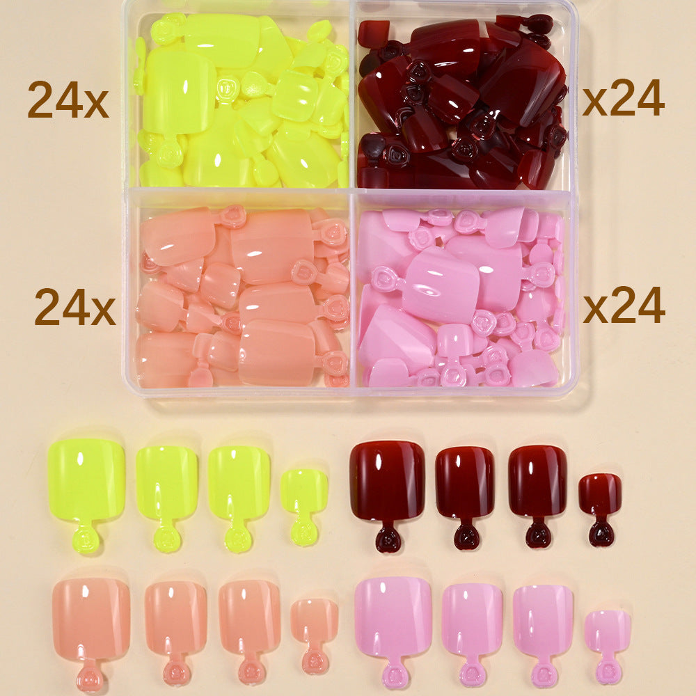 Women's assorted press-on nail tips set for easy DIY manicures. Trendy fake nails & nail art.
