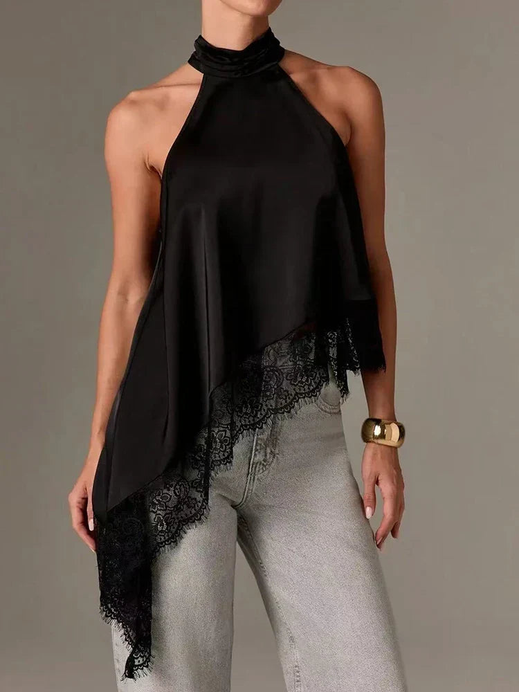 Women's asymmetric halter top with delicate lace trim, perfect for elegant smart casual summer outfits.