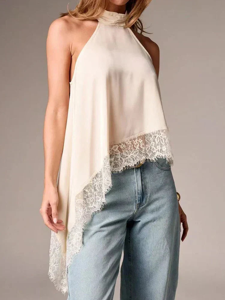 Elegant women's sleeveless asymmetric halter blouse with lace, relaxed fit for smart casual summer fashion.