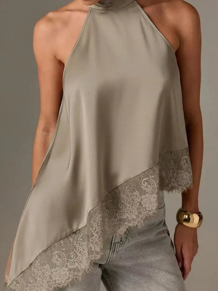 Stylish women's asymmetric halter top with sophisticated lace trim, a must-have for elegant summer casual apparel.