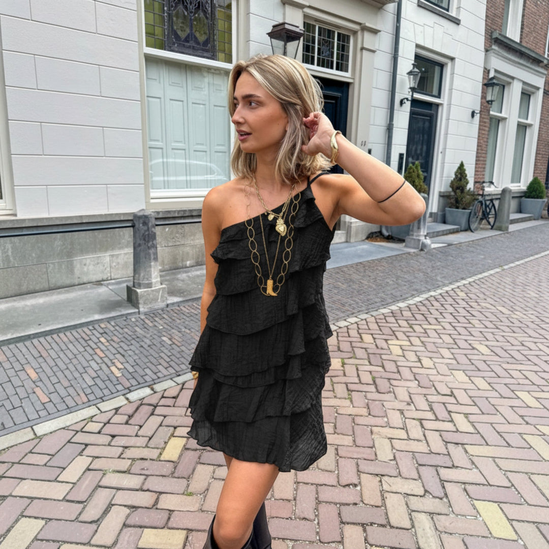 Stylish women's asymmetric ruffle mini dress, casual yet elegant, for warm weather.