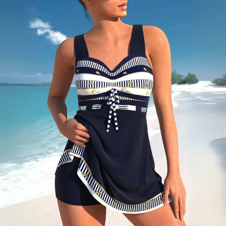 Stylish women's Aztec print tankini swimdress. Ruched modest swimwear for summer fashion, beachwear, & vacation.