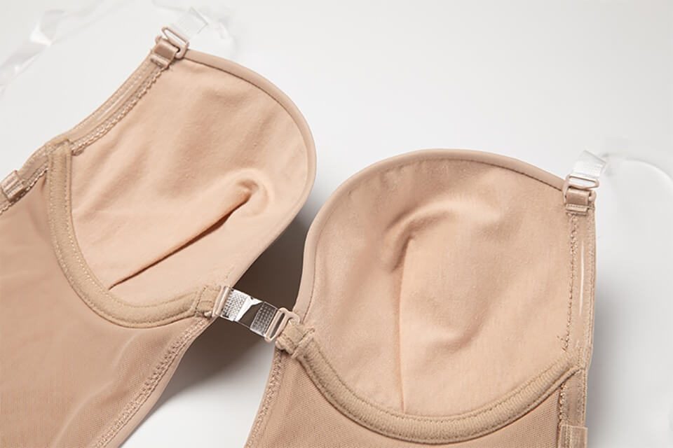 Seamless women's backless shapewear with a deep V design, ensuring invisible support & a smooth look.
