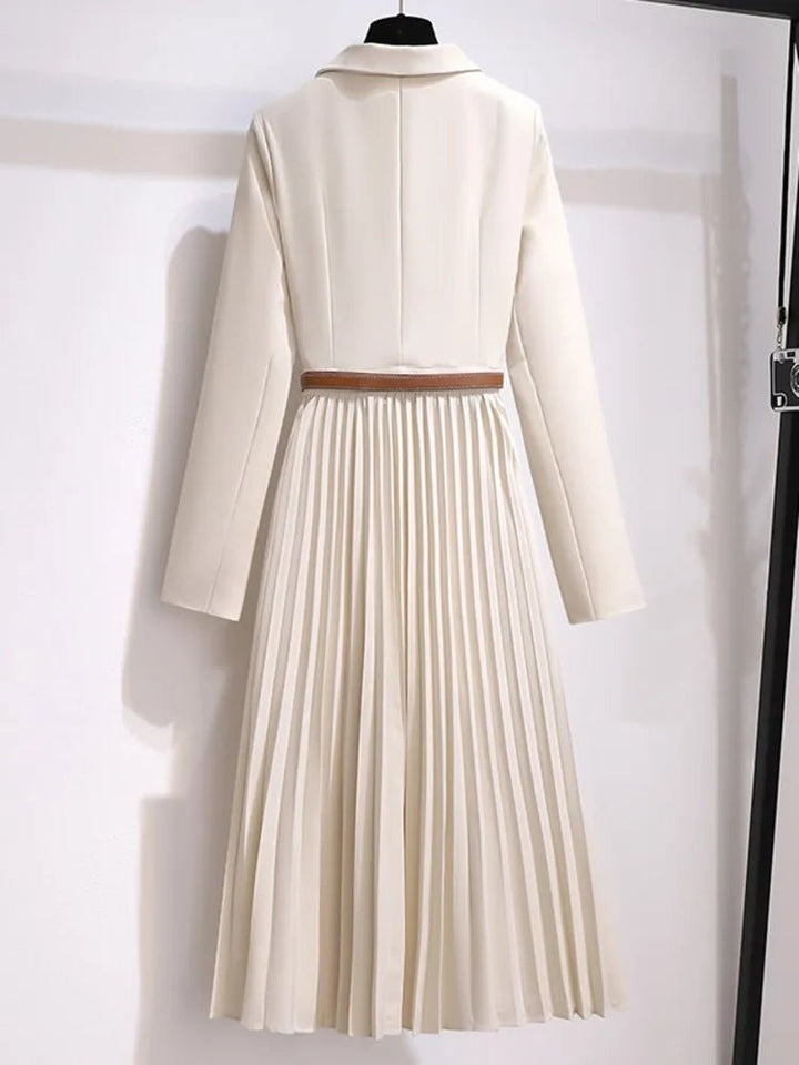 Modern women's blazer-style dress. Beige, with a flattering belt & elegant pleats. Ideal for professional attire.