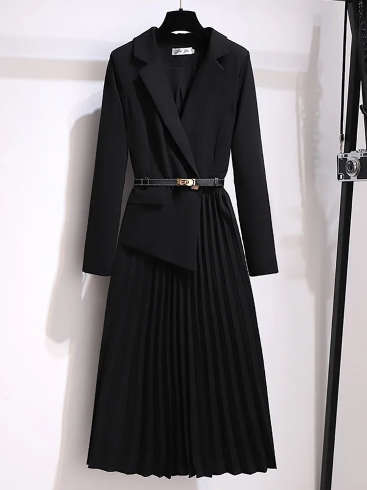 Versatile women's belted pleated midi blazer dress in black. Chic, sophisticated & comfortable for office or events.