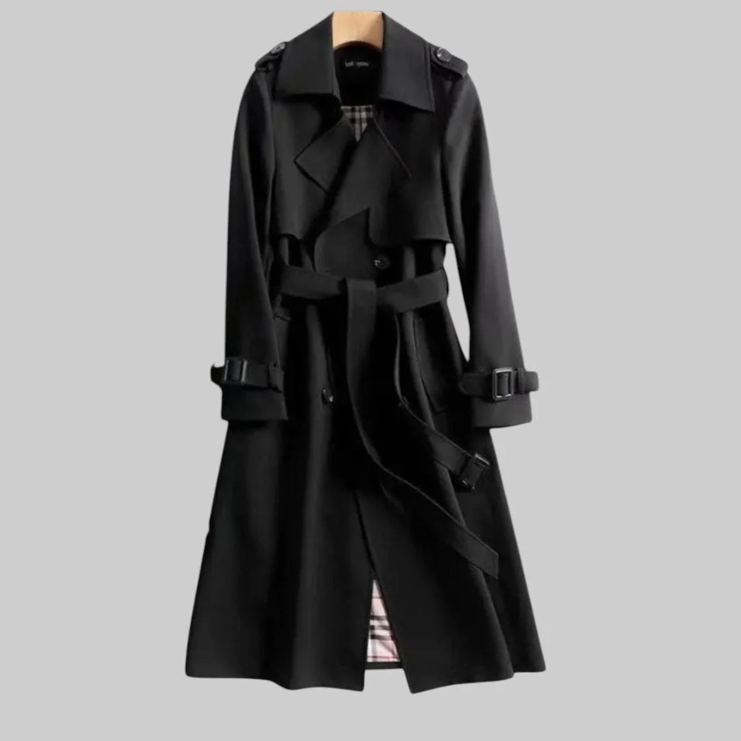 Classic women's beige double-breasted trench coat, belted for a flattering fit, featuring plaid lining.