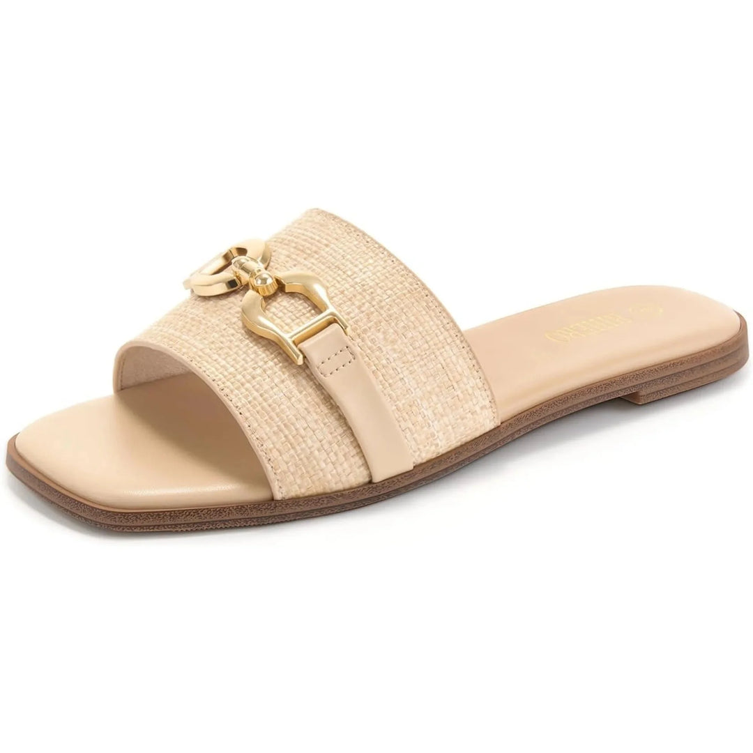 Women's beige slide sandals with an open toe and comfortable flat sole, perfect for effortless summer style.