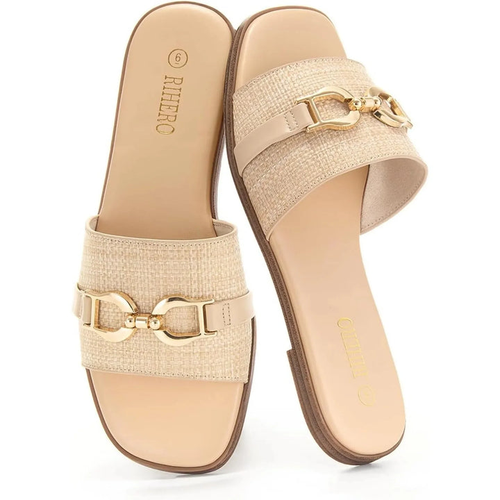 Comfortable women's beige slide sandals, ideal for all-day wear & casual summer outings. Flat sole design.